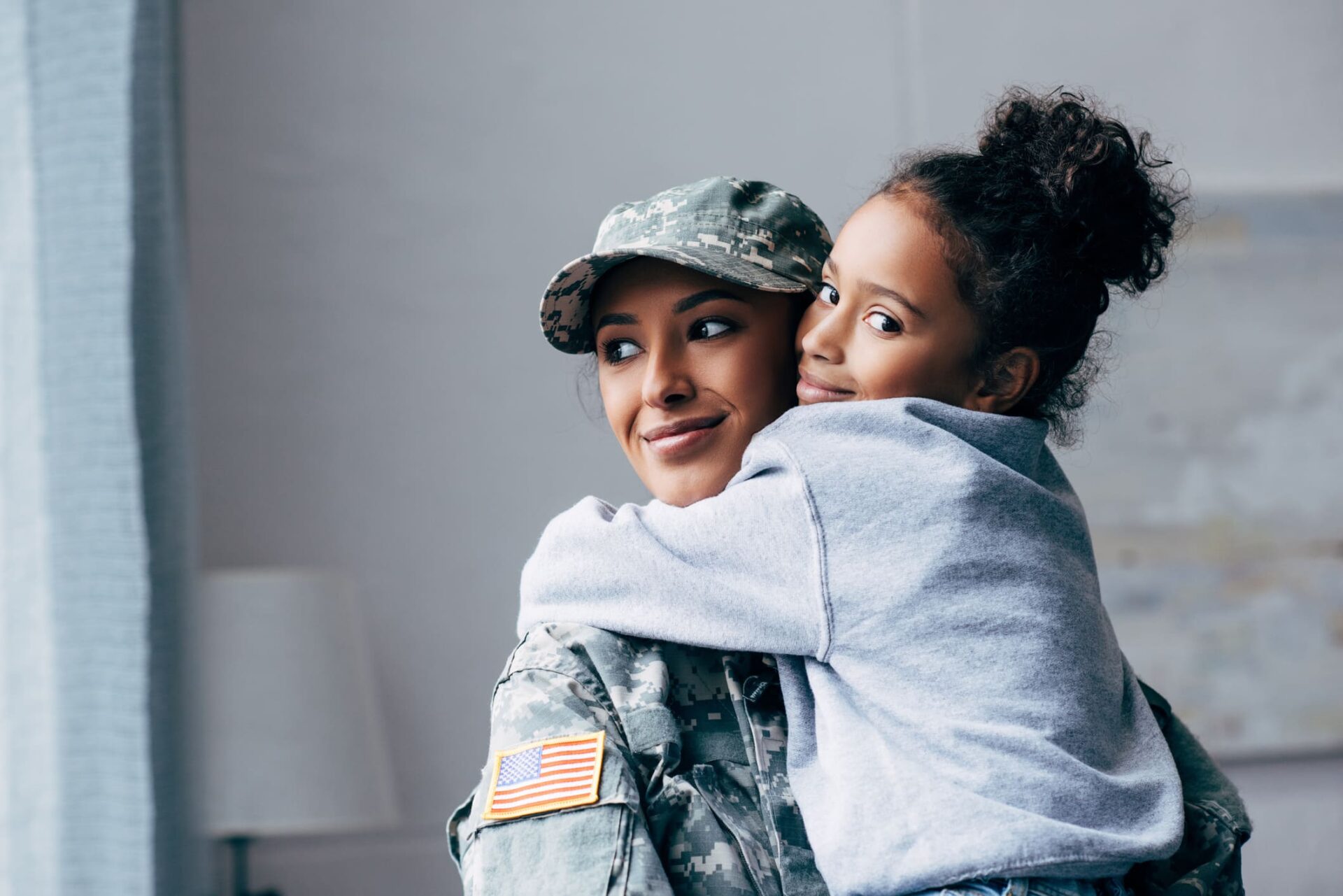 Military mother with ther daughter